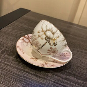 Coffee cup with saucer